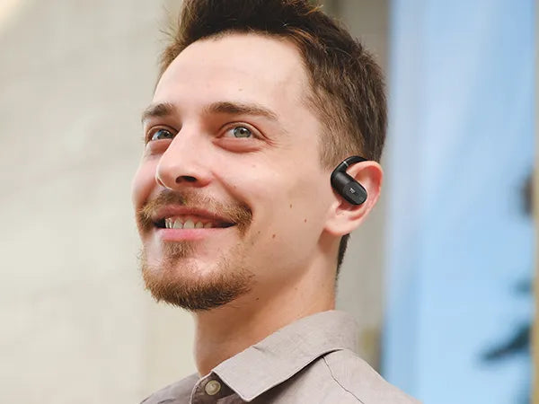 Walking outdoors with TOZO OpenWear open-ear headphones